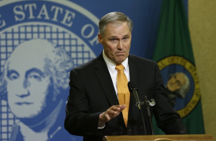 Gov. Jay Inslee calls legislators back to Olympia for a special session and vetoes 26 bills.