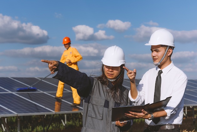 2-Prong Electrical Plug with Sun in background